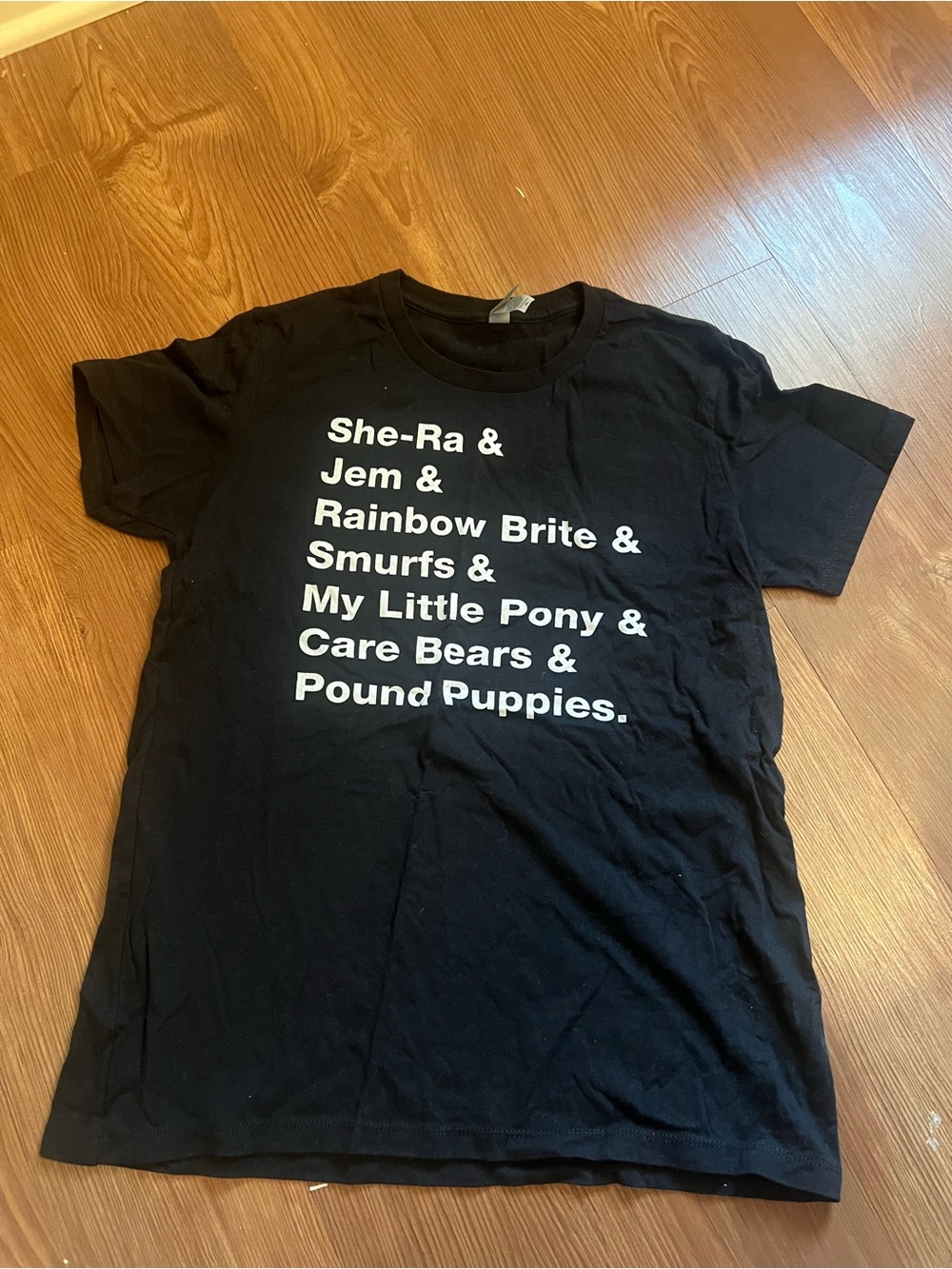 Source Unknown Black Tee with White Retro Cartoon Text